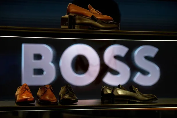 FILE PHOTO: Men's shoes are on display at the Boss store in London, Britain, May 30, 2024. REUTERS/Chris J. Ratcliffe/File Photo