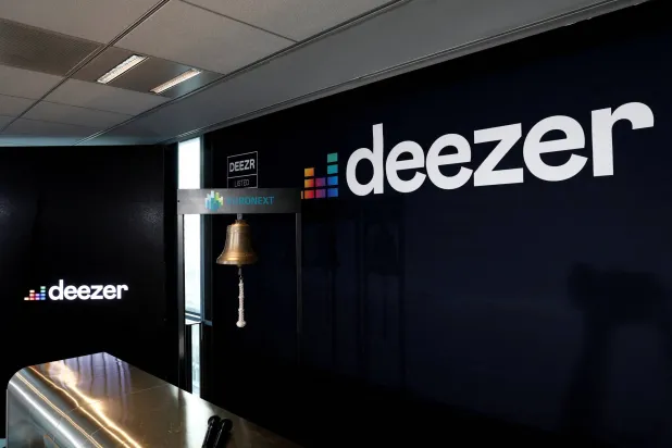 FILE PHOTO: The logo of French music streaming platform Deezer is seen at La Defense business and financial district in Courbevoie near Paris, France, July 5, 2022. REUTERS/Benoit Tessier/File Photo