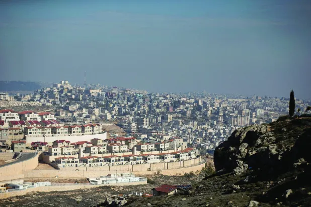 FILE PHOTO: A general view picture shows the Israeli settlement of Efrat in the Gush Etzion settlement block as Bethlehem is seen in the background, in the Israeli-occupied West Bank January 28, 2020. REUTERS/Ronen Zvulun/File Photo