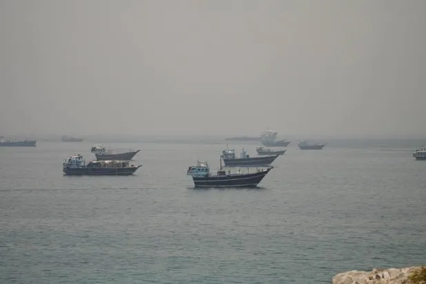  Vessels are anchored in the Strait of Hormuz, as seen from Musandam, Oman, June 11, 2026. (Reuters)