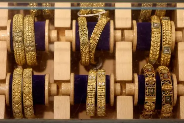 Gold bangles are displayed inside a jewellery store in the old quarters of Delhi, India, May 11, 2026. (Reuters)