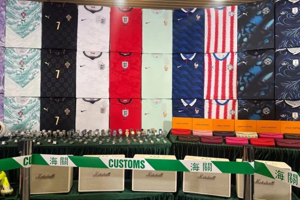  Hong Kong customs authorities showcase various types of fake goods they seized during a news conference at its headquarters in North Point, Hong Kong Thursday, June 11, 2026. (AP) 
