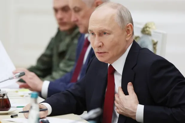  Russian President Vladimir Putin chairs a meeting with participants of the special military operation at the Senate Palace of the Kremlin in Moscow, Friday, June 12, 2026. (Vyacheslav Prokofyev, Sputnik, Kremlin Pool Photo via AP) 