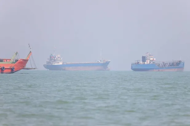 Vessels in the Strait of Hormuz near the beach of Bandar Abbas, Iran, June 11, 2026. Amirhosein Khorgooi/ISNA/WANA (West Asia News Agency) via Reuters