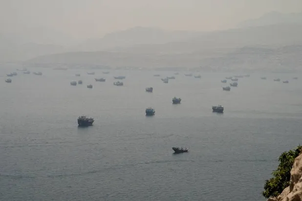 Vessels are anchored in the Strait of Hormuz, as seen from Musandam, Oman, June 11, 2026. (Reuters)