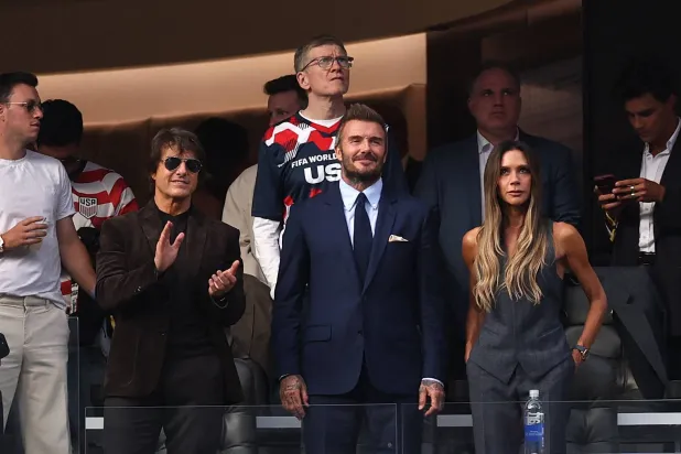 LOS ANGELES, CALIFORNIA - JUNE 12: Tom Cruise, David and Victoria Beckham pictured during the FIFA World Cup 2026 Group D match between USA and Paraguay at Los Angeles Stadium on June 12, 2026 in Los Angeles, California. Stu Forster/Getty Images/AFP  