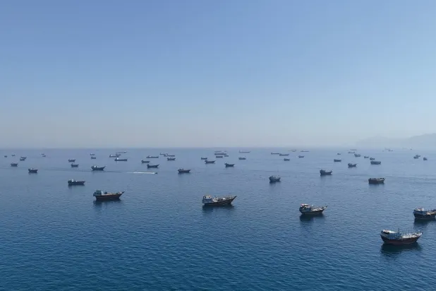 A drone view of vessels anchored in the Strait of Hormuz as seen from Musandam, Oman, June 8, 2026. (Reuters)