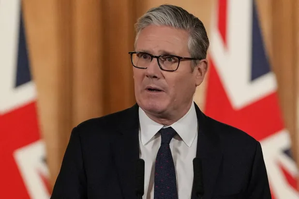  Britain's Prime Minister Keir Starmer attends a press conference at Downing Street in central London on June 15, 2026, to announce government action to protect children online. (Pool via Reuters)