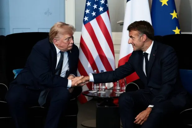 US President Donald Trump shakes hands with French President Emmanuel Macron as they attend a bilateral meeting during the G7 Summit in Evian-les-Bains, France, June 15, 2026. (Reuters)