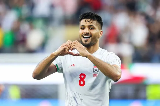 Iran forward Mohammad Mohebi celebrates after scoring a goal in the second half during the FIFA World Cup 2026 group stage match Iran against New Zealand, in Los Angeles, USA, 15 June 2026. (EPA)