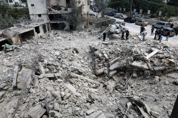 Destroyed buildings are seen following an Israeli strike in the village of Deir Qanoun Nahr, southern Lebanon, 15 June 2026, after the announcement of a US-Iran mediated preliminary framework to end regional military hostilities and lift the naval blockade on the Strait of Hormuz. (EPA)