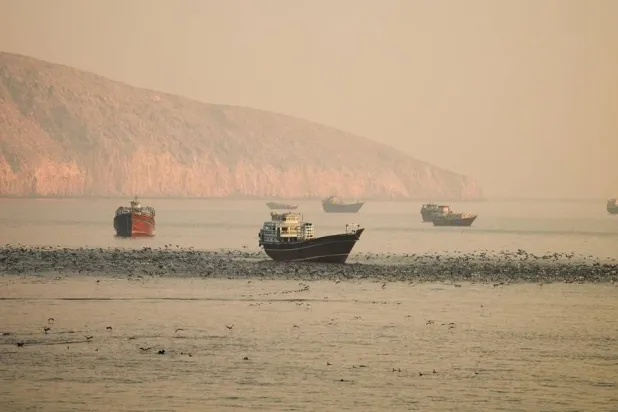  Vessels at the Strait of Hormuz, as seen from Musandam, Oman, June 16, 2026. (Reuters)