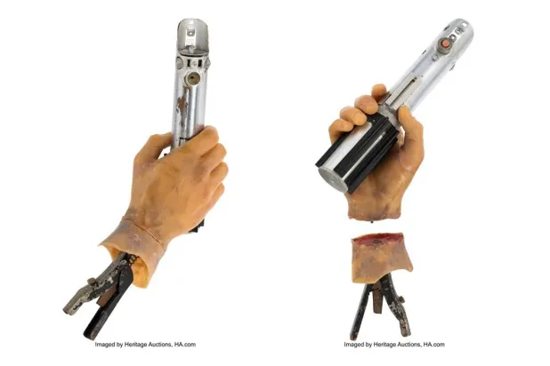 This combination of images released by Heritage Auctions show the light saber used on screen by Mark Hamill's character Luke Skywalker in the 1980 "Star Wars" sequel "The Empire Strikes Back." (Heritage Auctions via AP) 