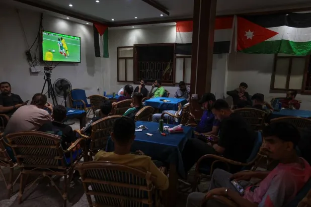  Palestinian football fans watch 2026 World Cup matches at a cafe in Gaza City, June 11, 2026. (Reuters)