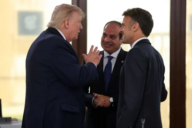  President Donald Trump speaks with Egyptian President Abdel Fattah al-Sisi, center, and French President Emmanuel Macron, right, at a working lunch with leaders of G7 and the Middle East in Evian-les-Bains, France, Tuesday, June 16, 2026. (AP) 