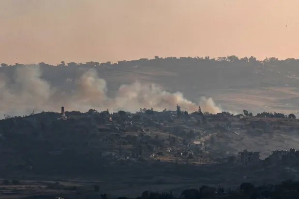 Smoke rises following an Israeli strike on southern Lebanon, as seen from the Israeli side of the border in the Upper Galilee, northern Israel, 16 June 2026, after the announcement of a US-Iran mediated preliminary framework to end regional military hostilities. EPA/ATEF SAFADI