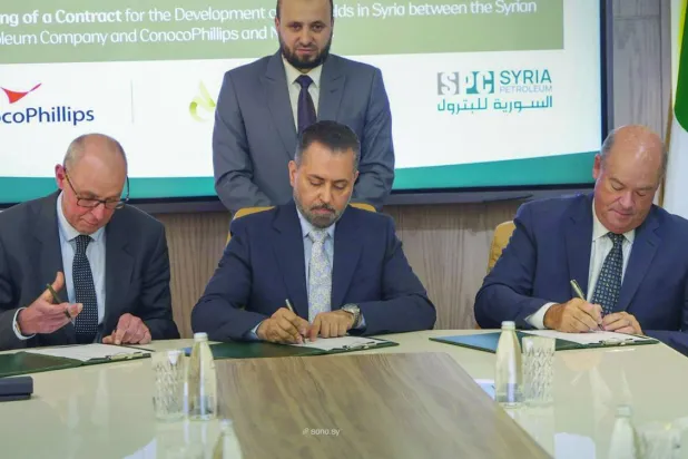 خلال توقيع العقد بين الشركة السورية للبترول و«كونوكو فيليبس» و«نوفاتيرا إنرجي» الأميركيتين (سانا)