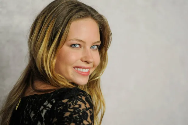 FILE - Actor Daveigh Chase poses at the Season 5 premiere of HBO series "Big Love," in Los Angeles on Jan. 12, 2011. (AP Photo/Chris Pizzello, File)