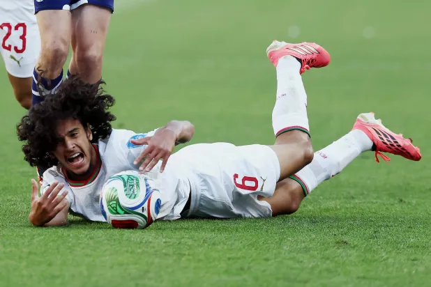 بوعدي قدم أداء قتالياً أمام اسكوتلندا (أ.ف.ب)