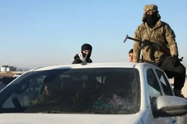 Rakka'daki Suriye askeri, (Arşiv- AFP)