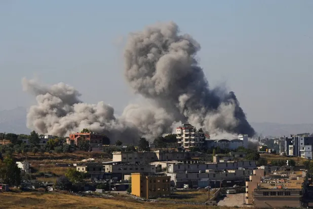 Smoke billows from southern Lebanon following an Israeli strike, as seen from Nabatieh, Lebanon, June 20, 2026. REUTERS/Stringer       TPX IMAGES OF THE DAY