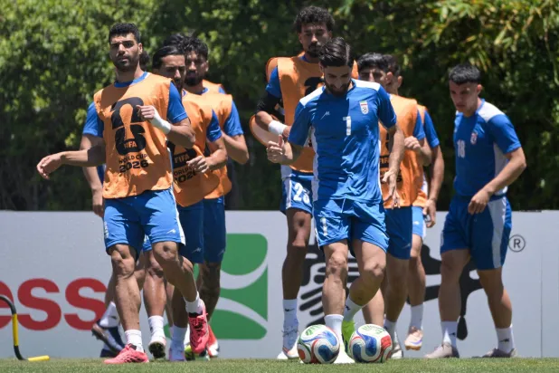 المنتخب الإيراني يواصل استعداداته للقاء بلجيكا (أ.ف.ب)