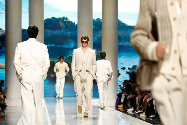 Models present Dolce & Gabbana Spring/Summer 2027 men's collection at Milan Fashion Week, in Milan, Italy June 20, 2026. (Reuters) 