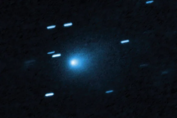This handout photograph released by NASA on June 22, 2026, shows a view taken by Hubble of the interstellar comet 3I/ATLAS on July 21, 2025, when the comet was 277 million miles from Earth. "AFP photo / NASA / ESA / David Jewitt (UCLA)"