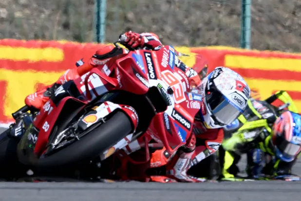 Team Ducati Lenovo Team's Marc Marquez (L) competes to win the MotoGP Grand Prix of Czechia in Brno, Czech Republic, on June 21, 2026. (Photo by Michal Cizek / AFP)