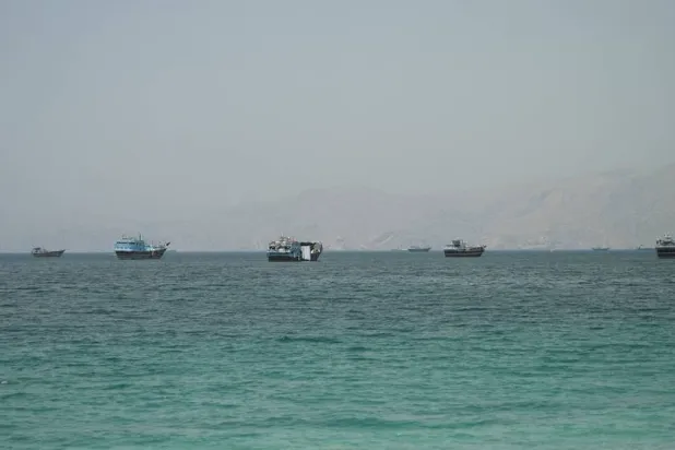  Vessels at the Strait of Hormuz, as seen from Musandam, Oman, June 22, 2026. (Reuters)