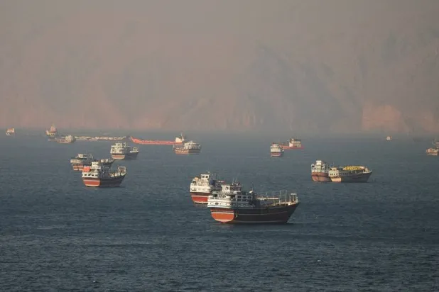 Vessels at the Strait of Hormuz, as seen from Musandam, Oman, June 15, 2026. (Reuters)