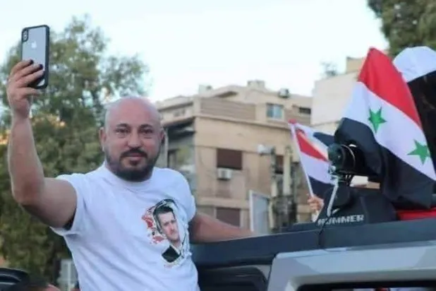 متداولة لوسيم الأسد متباهياً بسطوته فترة النظام البائد