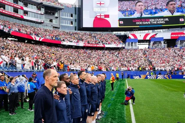  England head coach Thomas Tuchel listens to the national anthem ahead the World Cup Group L soccer match between England and Ghana in Foxborough, Mass., near Boston, Tuesday, June 23, 2026. (AP) 