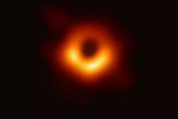 An actual image of the black hole where scientists looked for a ring of light, which is matter and radiation circling at extreme speeds around a region of darkness representing the black hole. (Event Horizon Telescope collaboration)