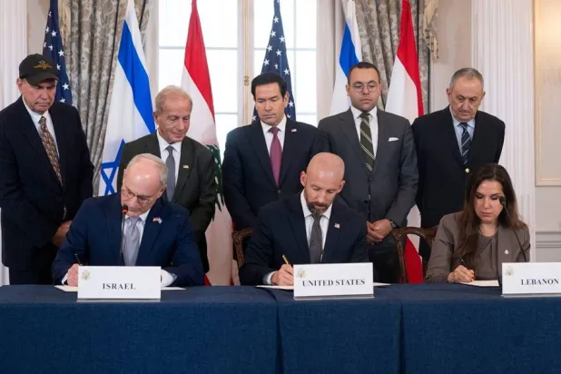 US Secretary of State Marco Rubio and others watch, seated from left, Israel's Ambassador to the US Yechiel Leiter, counselor Dan Holler, and Lebanon's Ambassador to the US Nada Hamadeh, sign a framework agreement, described as a first step toward peace following months of conflict between Israel and the Lebanese group Hezbollah, at the State Department, Friday, June 26, 2026, in Washington. (AP) 