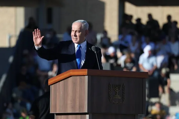 Israeli Prime Minister Benjamin Netanyahu speaks during the graduation ceremony of the Israel Defense Forces officers' course at a military base near Mitzpe Ramon, southern Israel, 25 June 2026. (EPA)