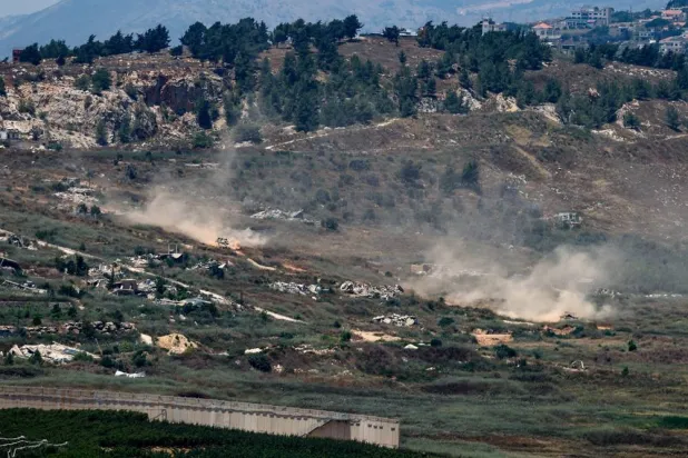  Israeli tanks maneuver in Lebanon, after Lebanon and Israel signed a framework agreement following US-mediated talks, as seen from northern Israel, June 27, 2026. (Reuters)