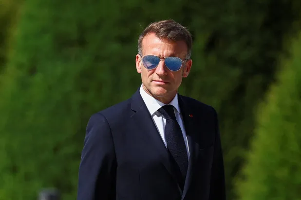 France's President Emmanuel Macron looks on during a welcoming ceremony for Thailand's King Maha Vajiralongkorn and Queen Suthida (not pictured) in the courtyard of the Hotel des Invalides in Paris on June 29, 2026, as part of an official state visit of the Thai King to France. (AFP)