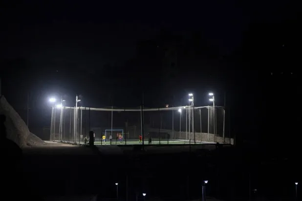  Egyptian youths play football in an open area beside a mountain near Cairo, Egypt, June 29, 2026, as the country follows the FIFA World Cup. (Reuters)