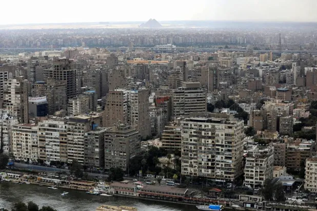 A general view of buildings and the Great Pyramids in Cairo, Egypt, March 25, 2026. (Reuters)
