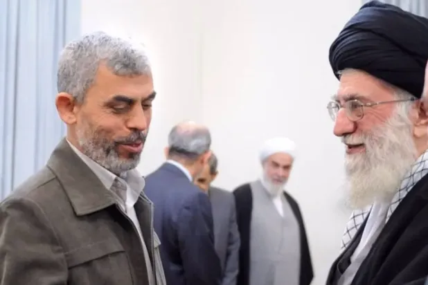 A photo released by Iran's Nour News of a previous meeting between Khamenei and Sinwar