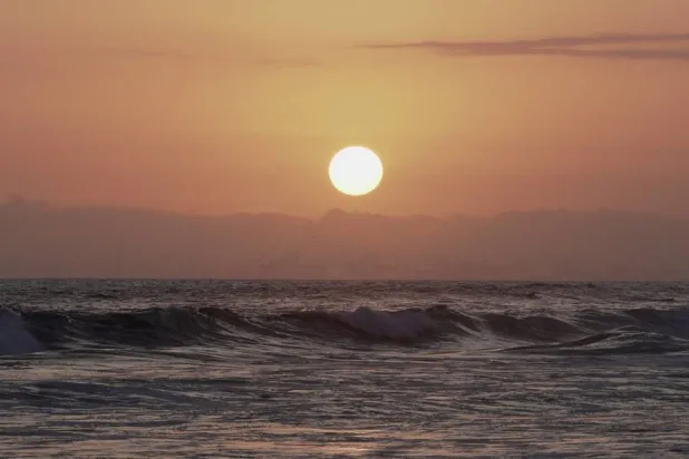 The sun sets over the Pacific Ocean, as seen from Huntington Beach, California, US, June 29, 2026. (Reuters)