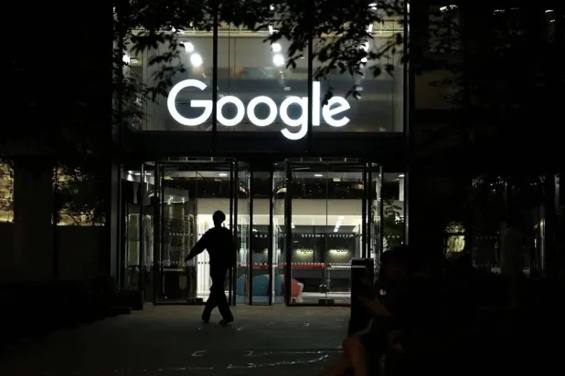 A pedestrian walks past the Google offices in London, Britain, August 14, 2025. (Reuters)
