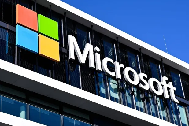 FILED - 30 January 2026, Bavaria, Munich: FILE PHOTO - The Microsoft logo can be seen on the Microsoft Germany headquarters building in Munich. Photo: Sven Hoppe/dpa