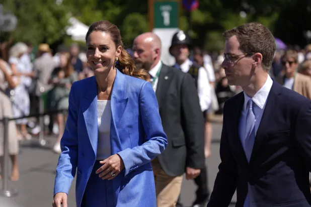 Britain's Kate, the Princess of Wales walks, during a visit on day four of the Wimbledon Tennis Championships in London, Thursday, July 2, 2026. (AP Photo/Andrew Matthews)