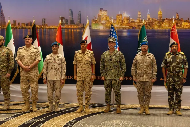Participants pose for a family photo at the Bahrain conference. (CENTCOM)