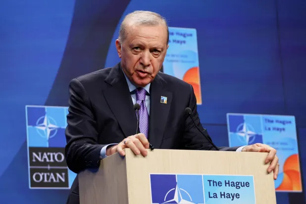 FILE PHOTO: Türkiye's President Recep Tayyip Erdogan speaks during a press conference at the NATO summit in The Hague, Netherlands June 25, 2025. REUTERS/Piroschka Van De Wouw/File Photo
