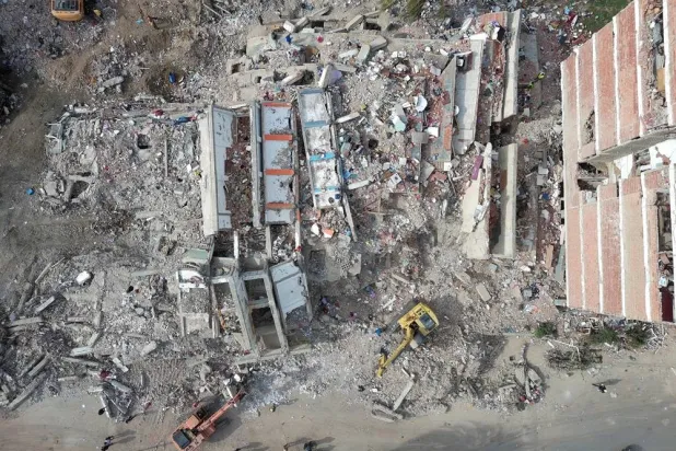  A drone view shows heavy machinery being used at the site of a damaged buildings in the aftermath of the June 24 earthquakes, in La Guaira, Venezuela, July 4, 2026. (Reuters)