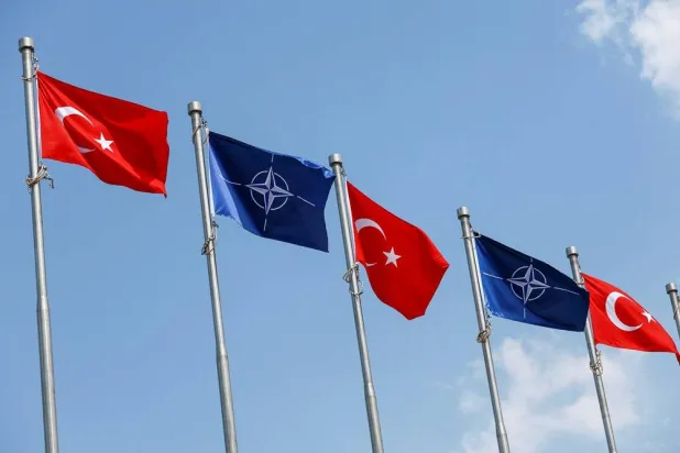  Turkey and NATO flags wave ahead of the NATO summit, in Ankara, Türkiye, July 4, 2026. (Reuters)