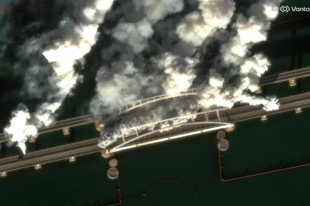 File photo: This handout satellite image courtesy of 2026 Vantor taken on June 22, 2026 and made available on June 23, 2026, shows smoke generators on Crimea Bridge, also called Kerch Strait Bridge, which spans the Kerch Strait, in Kerch. (Photo by Handout / Satellite image 2026 Vantor / AFP) 